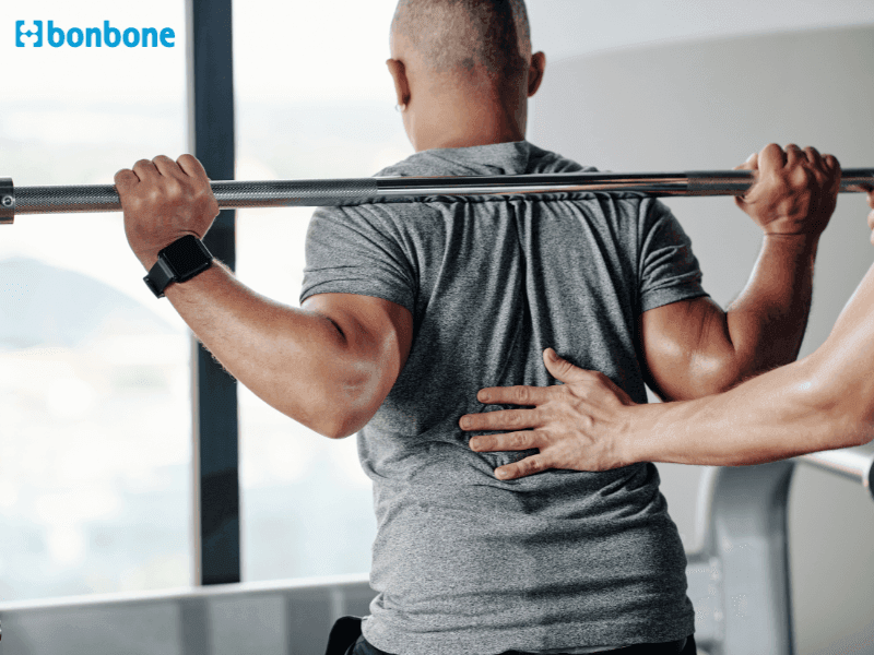 Tác động của nặng khi tập squat đến lưng dưới